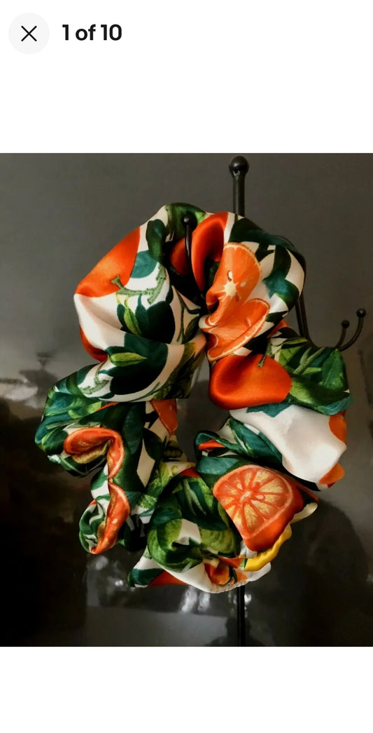 CE's designer citronella scrunchie in Silk
